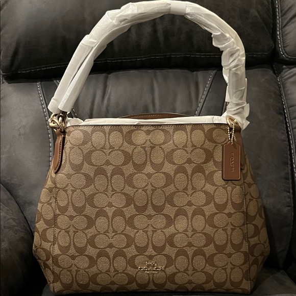 Coach Handbags - Coach Tan and Brown Signature Shoulder Bag